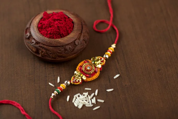 Індійський Фестиваль Raksha Bandhan Тло Елегантним Rakhi Rice Grains Kumkum — стокове фото