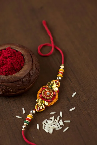 Індійський Фестиваль Raksha Bandhan Тло Елегантним Rakhi Rice Grains Kumkum — стокове фото