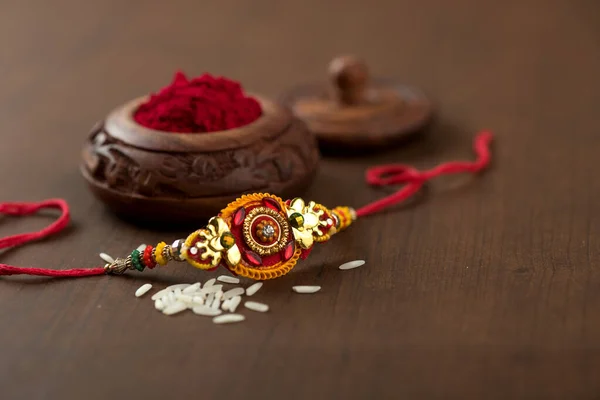 Індійський Фестиваль Raksha Bandhan Тло Елегантним Rakhi Rice Grains Kumkum — стокове фото