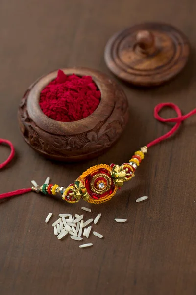 Індійський Фестиваль Raksha Bandhan Тло Елегантним Rakhi Rice Grains Kumkum — стокове фото