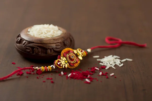 Індійський Фестиваль Raksha Bandhan Тло Елегантним Rakhi Rice Grains Kumkum — стокове фото