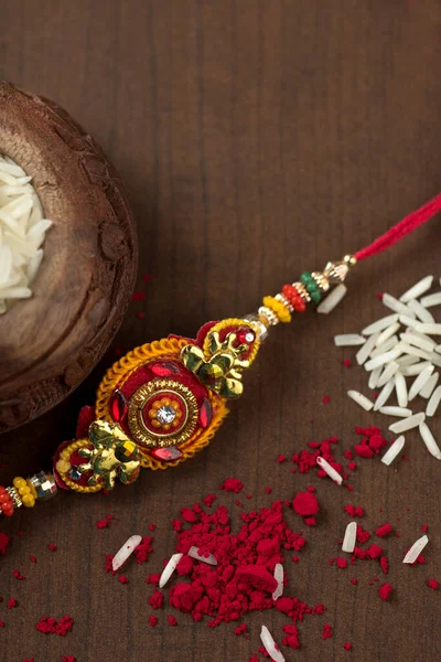 Індійський Фестиваль Raksha Bandhan Тло Елегантним Rakhi Rice Grains Kumkum — стокове фото