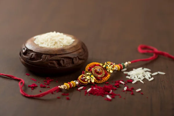 Індійський Фестиваль Raksha Bandhan Тло Елегантним Rakhi Rice Grains Kumkum — стокове фото