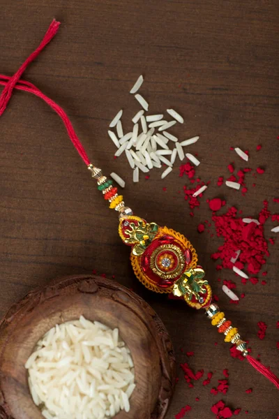 Індійський Фестиваль Raksha Bandhan Тло Елегантним Rakhi Rice Grains Kumkum — стокове фото