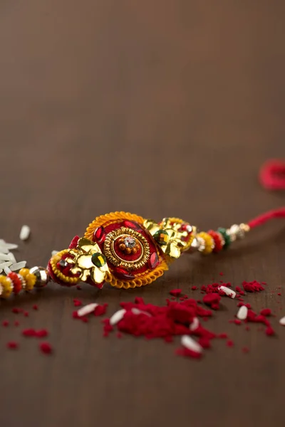 Індійський Фестиваль Raksha Bandhan Тло Елегантним Rakhi Rice Grains Kumkum — стокове фото