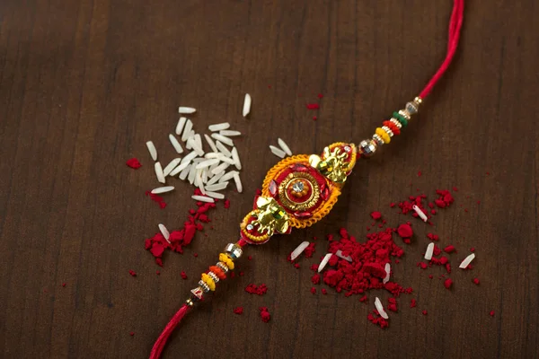 Індійський Фестиваль Raksha Bandhan Тло Елегантним Rakhi Rice Grains Kumkum — стокове фото