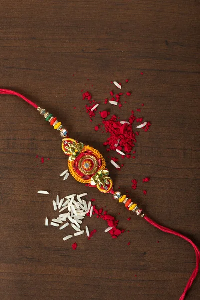 Індійський Фестиваль Raksha Bandhan Тло Елегантним Rakhi Rice Grains Kumkum — стокове фото