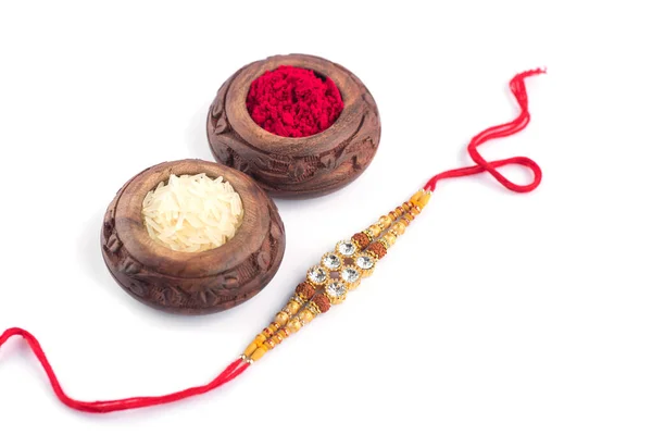 Raksha Bandhan Тло Елегантним Rakhi Rice Grains Kumkum Білому Тлі — стокове фото