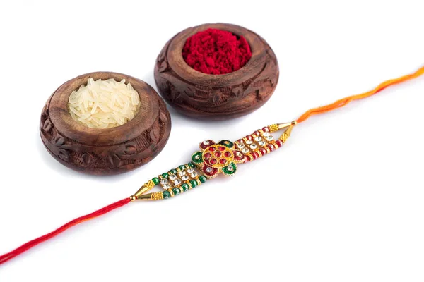 Raksha Bandhan Тло Елегантним Rakhi Rice Grains Kumkum Білому Тлі — стокове фото