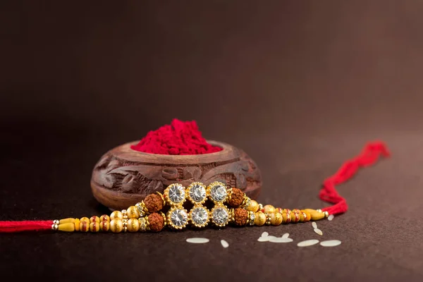 Raksha Bandhan Baggrund Med Elegant Rakhi Ris Korn Kumkum Traditionel - Stock-foto