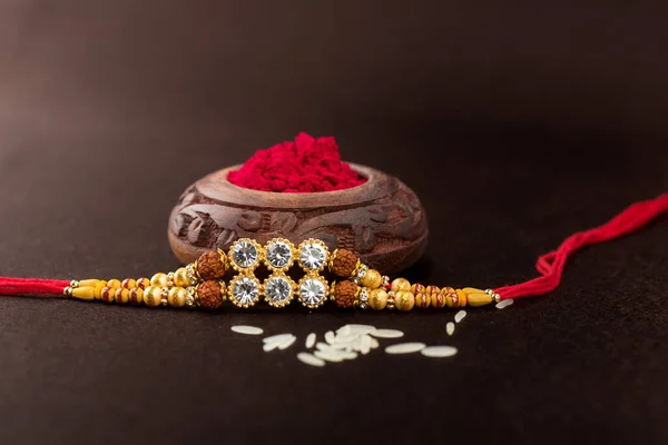 Raksha Bandhan Fundo Com Elegante Rakhi Grãos Arroz Kumkum Uma — Fotografia de Stock