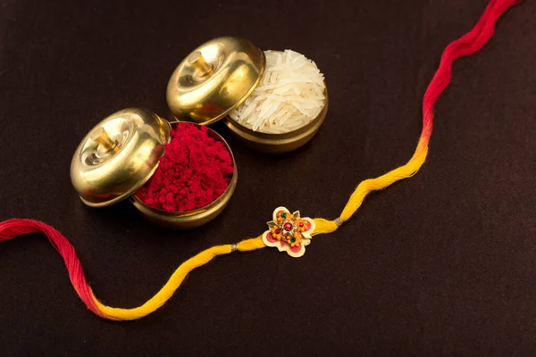 Raksha Bandhan Background Elegant Rakhi Rice Grains Kumkum Traditional Indian — Stock Photo, Image