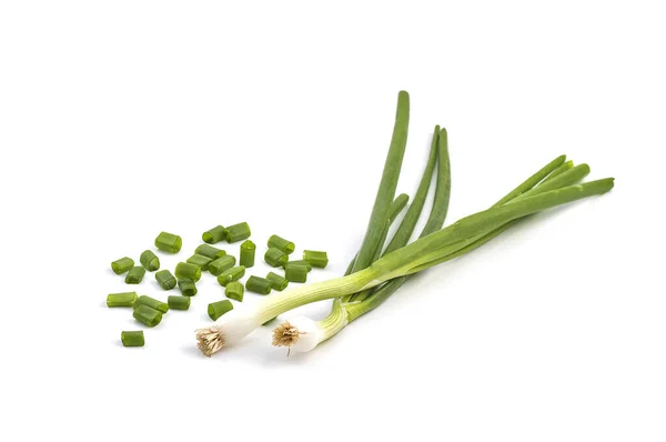 Fresh ripe green spring onions (shallots or scallions) with fresh chopped green onions on white background — Stock Photo, Image