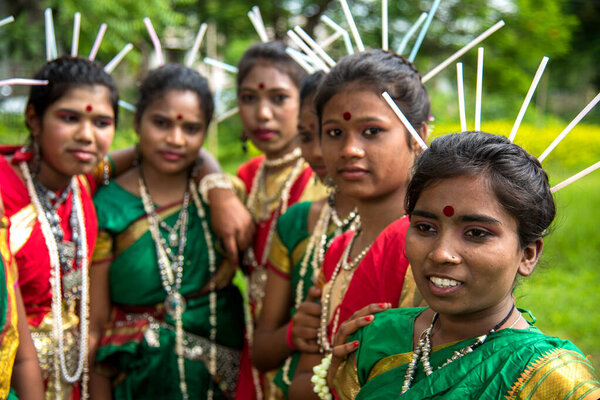 AMRAVATI, MAHARASHTRA, INDIA - AUGUST 9 : Group of Gondi tribes celebrating world tribal day by performing folk Dance in Amravati, Maharashtra, India