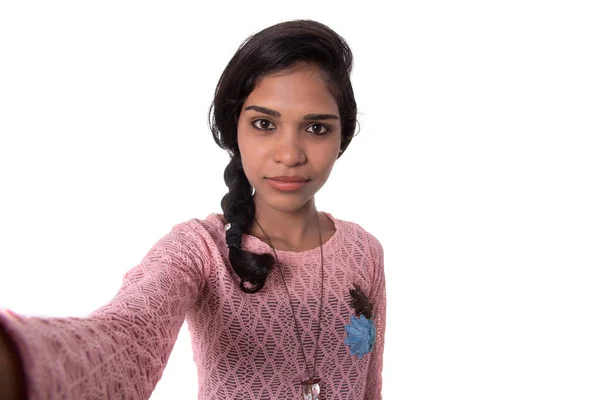 Young happy smile girl take selfie on white background — Stock Photo, Image