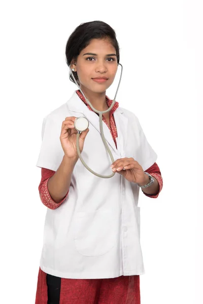 Woman doctor with a stethoscope isolated on white background Royalty Free Stock Photos