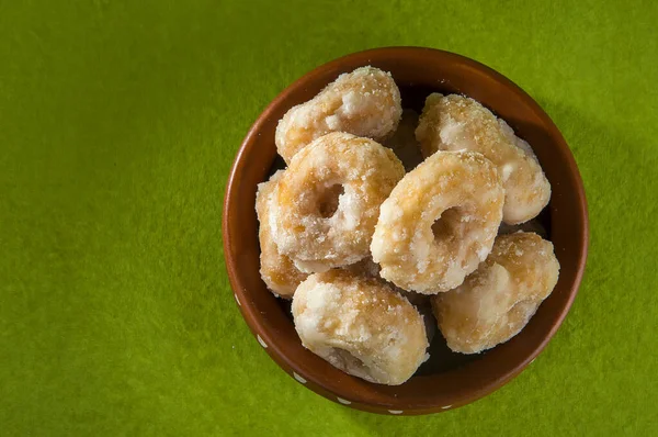 Indian Traditional Sweet Food Balushahi on a green background
