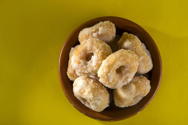 Indian Traditional Sweet Food Balushahi on a yellow background