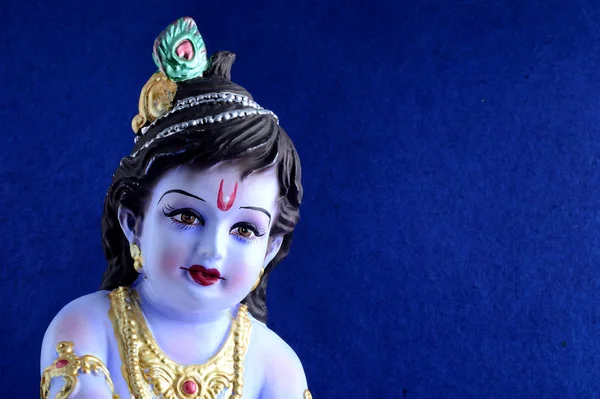 Hindoe God Krishna op blauwe achtergrond — Stockfoto