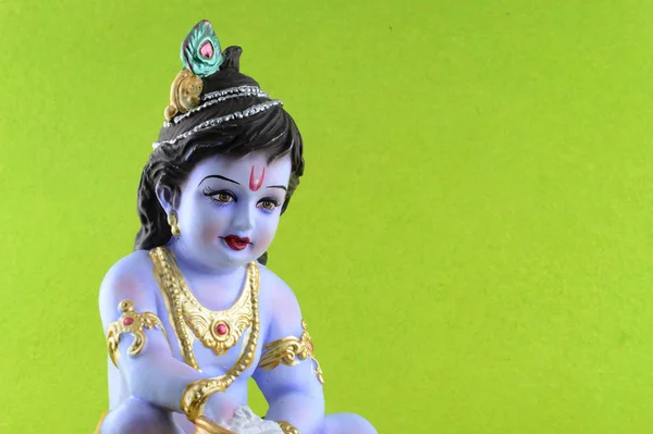 Dios hindú Krishna sobre fondo verde — Foto de Stock