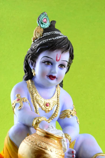 Hindu God Krishna on green background — Stock Photo, Image