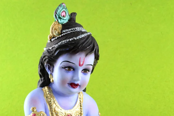 Індуський бог Крішна на зеленому тлі — стокове фото