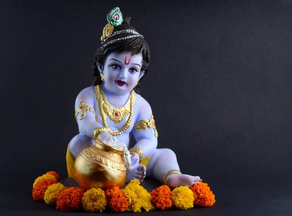 Hindu God Krishna on dark background — ストック写真