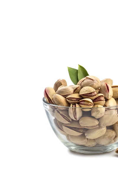 Pistachios in Glass Bowl on white background — Stock Photo, Image