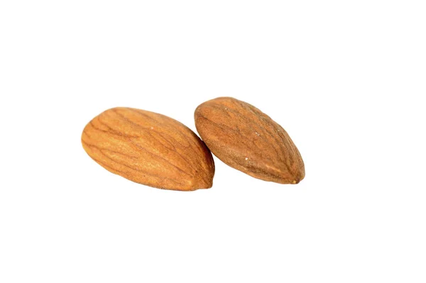 Chutné mandle ořechy izolovaných na bílém pozadí — Stock fotografie