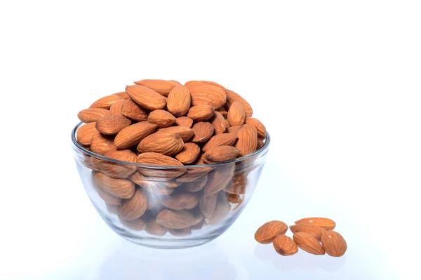 Almonds in a bowl isolated on a white background — Stock Photo, Image