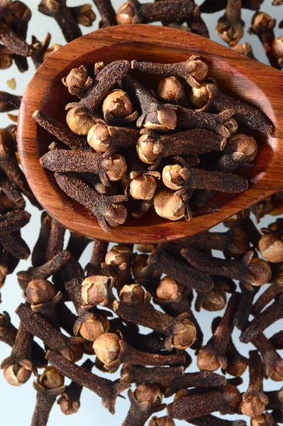 Cloves Spice Wooden Spoon Close Food Background Isolated White Background — Stock Photo, Image