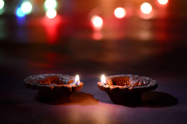 Clay diya lamps lit during Diwali Celebration. Greetings Card Design Indian Hindu Light Festival called Diwali — Stock Photo, Image