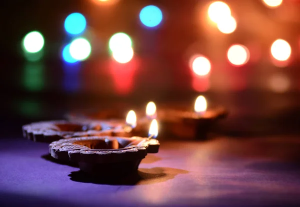 Clay diya lamps lit during Diwali Celebration. Greetings Card Design Indian Hindu Light Festival called Diwali — Stock Photo, Image