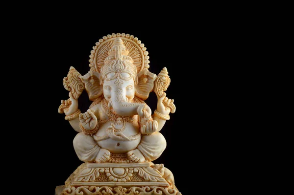 Hindu God Ganesha. Ganesha Idol on brown background — Stock Photo, Image