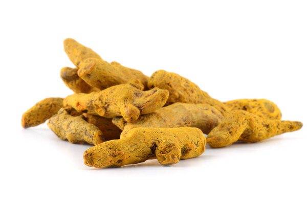Dry Turmeric roots or barks isolated on white background