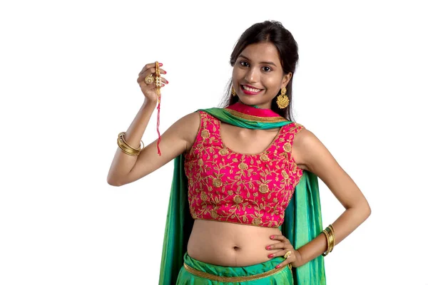 Hermosa Chica Mostrando Rakhi Ocasión Raksha Bandhan Sobre Fondo Blanco —  Fotos de Stock