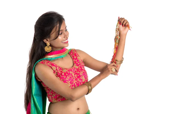 Menina Bonita Mostrando Rakhi Por Ocasião Raksha Bandhan Fundo Branco — Fotografia de Stock