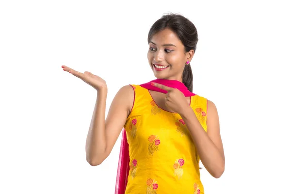 Beautiful Girl Holding Presenting Something Hand Happy Smiling — Stock Photo, Image