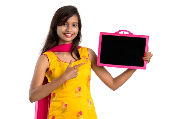 Beautiful Young Girl Holding Showing Something Chalkboard Slate Isolated White — Stock Photo, Image