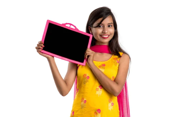 Beautiful Young Girl Holding Showing Something Chalkboard Slate Isolated White — Stock Photo, Image