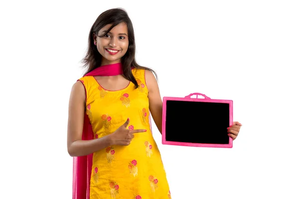 Beautiful Young Girl Holding Showing Something Chalkboard Slate Isolated White — Stock Photo, Image