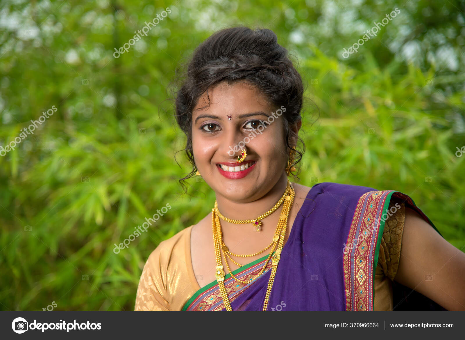 Image of Indian traditional Beautiful Woman Wearing an traditional Saree  And Posing On The Outdoor With a Smile Face-JA674305-Picxy