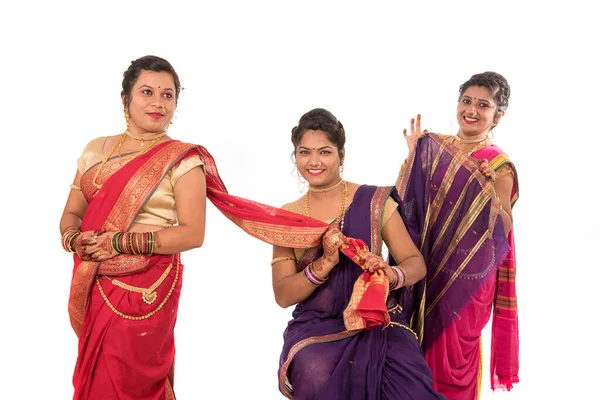 Traditional Beautiful Indian young girls in saree posing on white  background 4976551 Stock Photo at Vecteezy