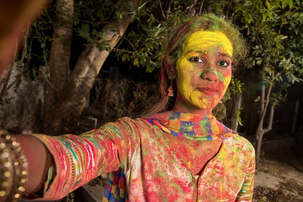 Young Girl Colorful Face Taking Selfie Using Smartphone Camera Holi — Stock Photo, Image