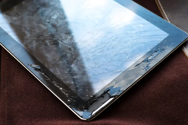 Tablet computer with broken glass screen