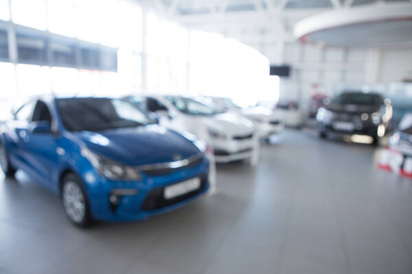 Car sales, market place, blurry image