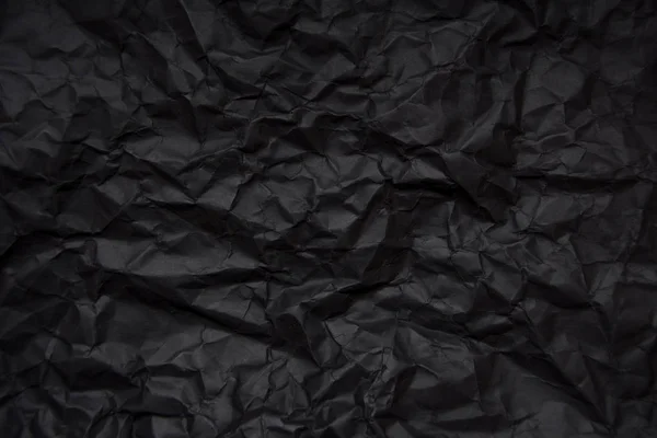 Blank crumpled black paper — Stock Photo, Image