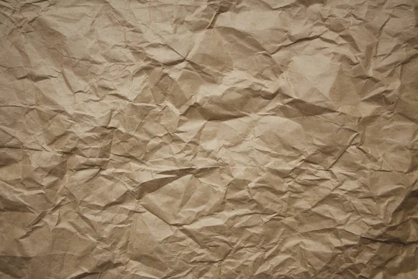 Brown rough crumpled recycled paper texture — Stock Photo, Image