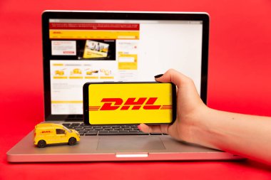 26 08 2019 Tula: DHL on the phone display. Logo clipart