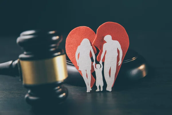 Family figure and gavel on table. Family law